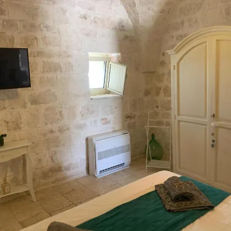 Trulli Tesoro Acomodação com café da manhã Cisternino Exterior foto