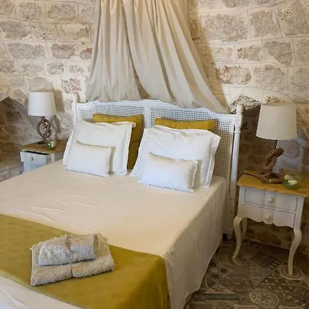 Trulli Tesoro Acomodação com café da manhã Cisternino Exterior foto
