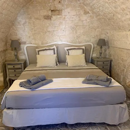 Trulli Tesoro Acomodação com café da manhã Cisternino Exterior foto